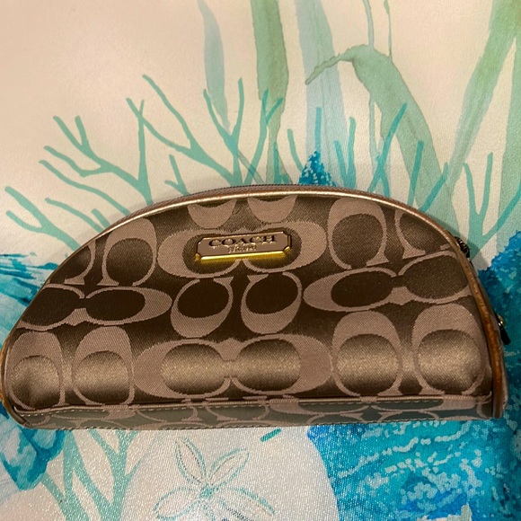Coach Handbags - Coach cosmetic case - used - wear on outside corners to piping but fairly clean